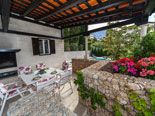 Outdoor dining terrace in villa in Baska voda in Croatia