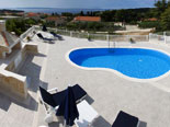 Big terrace with the pool and BBQ makes this villa in Sumartin on Brac island Dalmatia Croatia perfect for your summer vacation